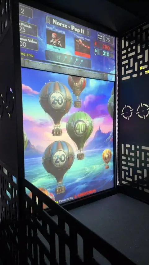 Balloon-themed game mode on the Krazy Darts screen