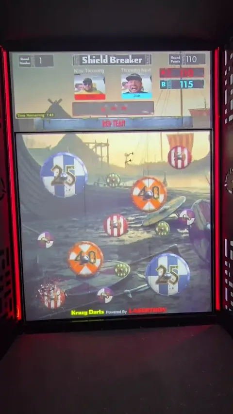 Shield Breaker game in progress on a Krazy Darts booth