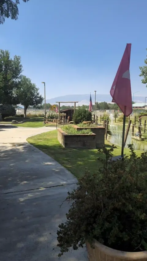 Mini golf hole with mountain backdrop